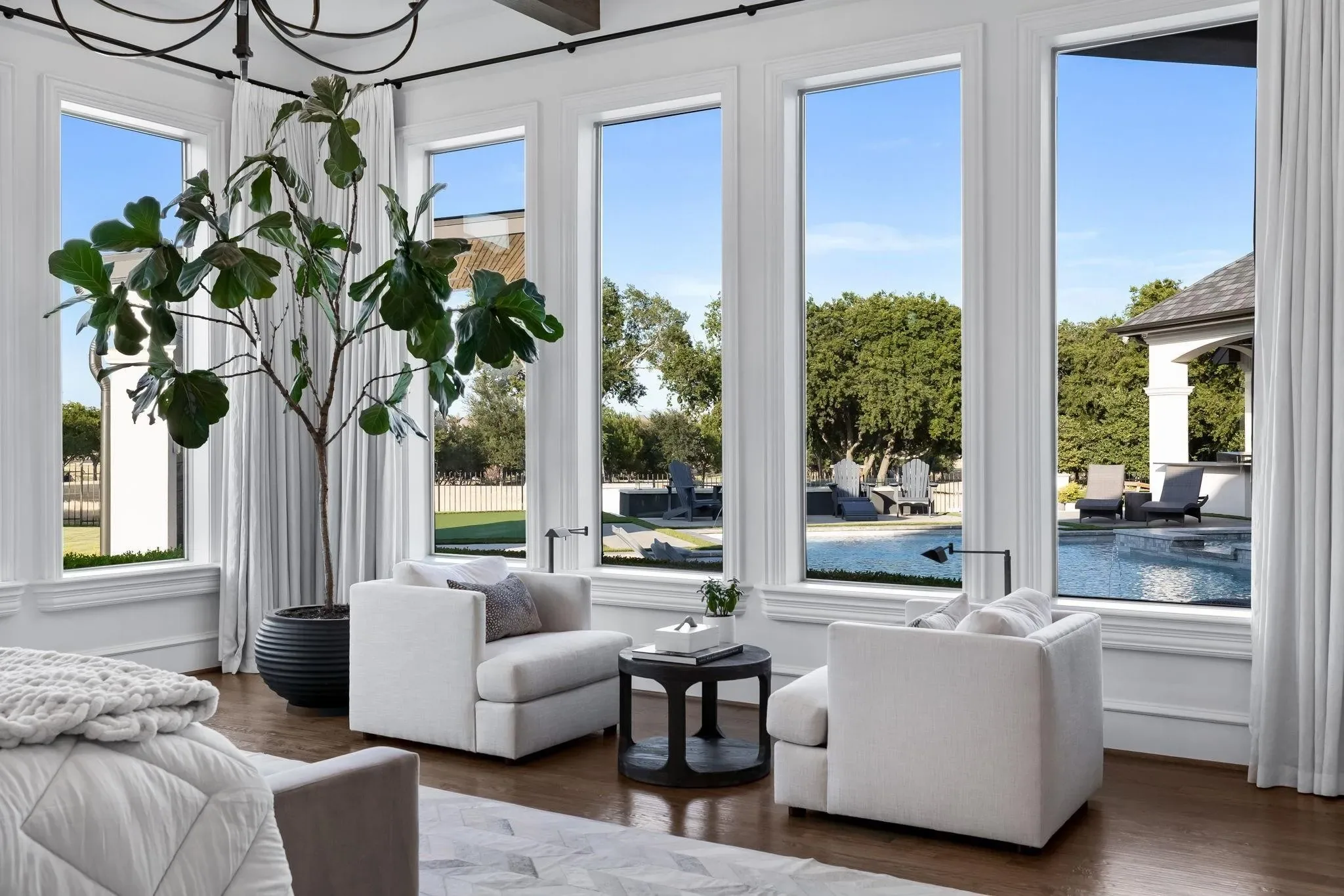 Interior of a custom home looking toward the windows, mid-build at Craig Ranch, McKinney