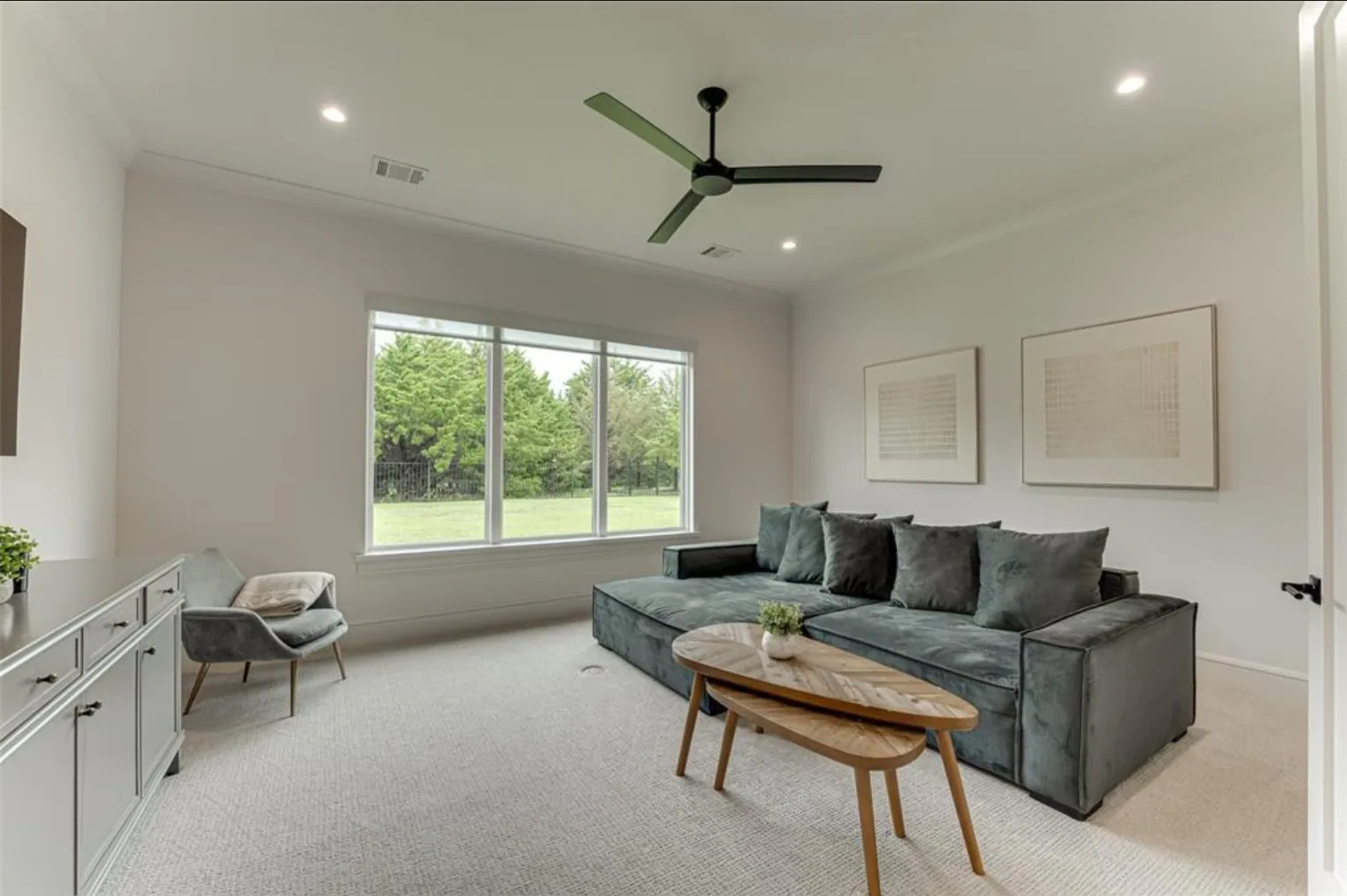 Interior of a custom home toward the adjoining room, in daylight at Fairways of Heath Crossing