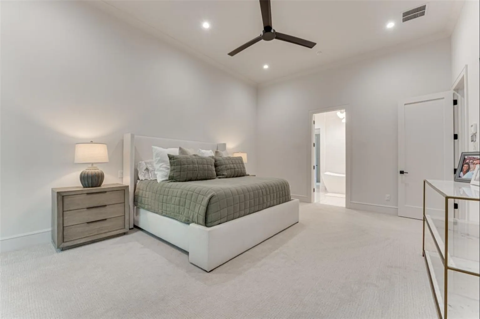 Interior of a custom home looking toward the windows, with the finishes in at Fairways of Heath Crossing