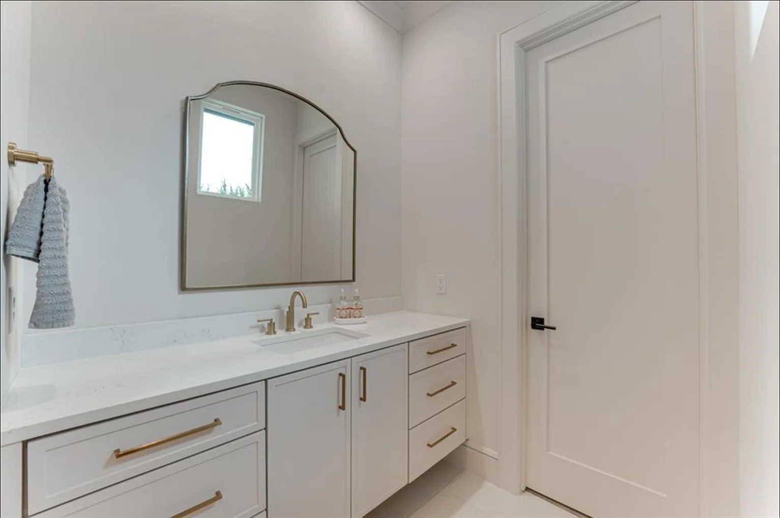 Interior of a custom home toward the adjoining room, with the finishes in at Fairways of Heath Crossing