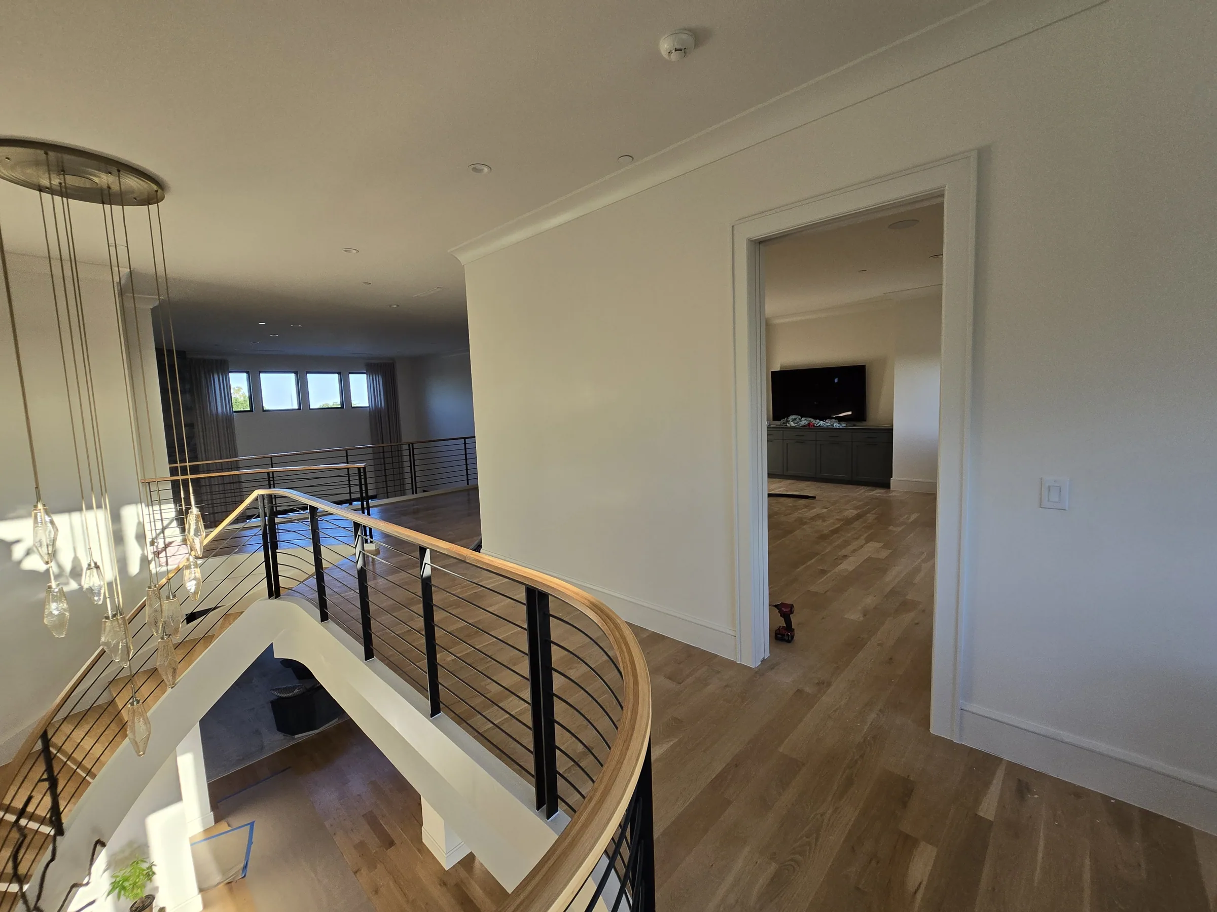 Interior of a custom home from the far corner, in daylight on private acreage in Heath