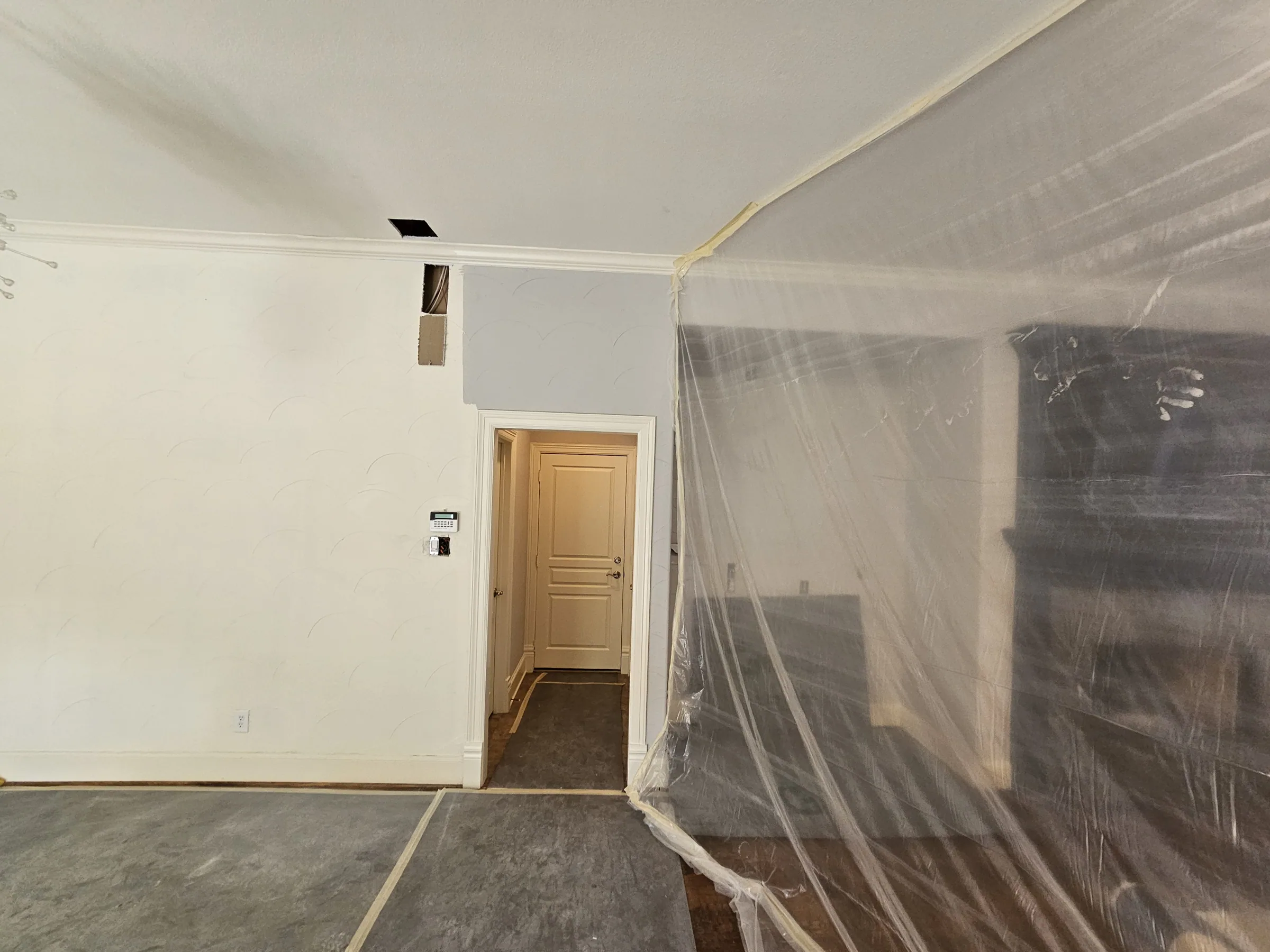Interior of a custom home toward the ceiling detail, in daylight on an interior remodel
