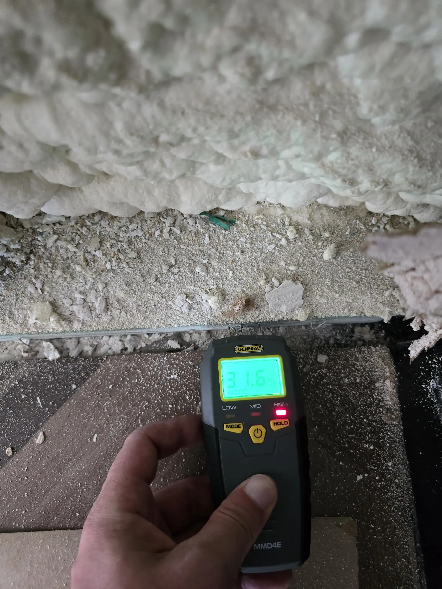 Moisture and leak diagnostic work showing water staining, with the space empty during leak diagnostics