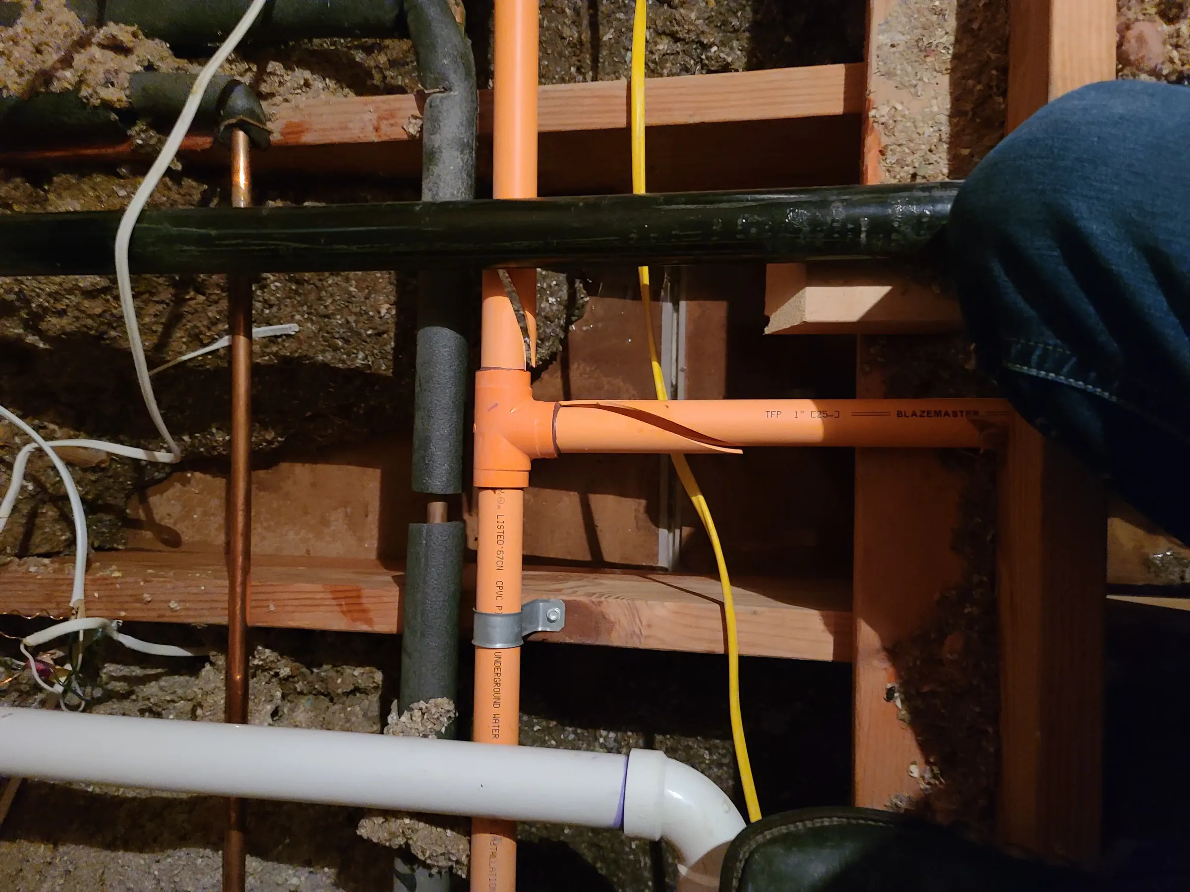 Moisture and leak diagnostic work under the fixture, with the trim set during leak diagnostics