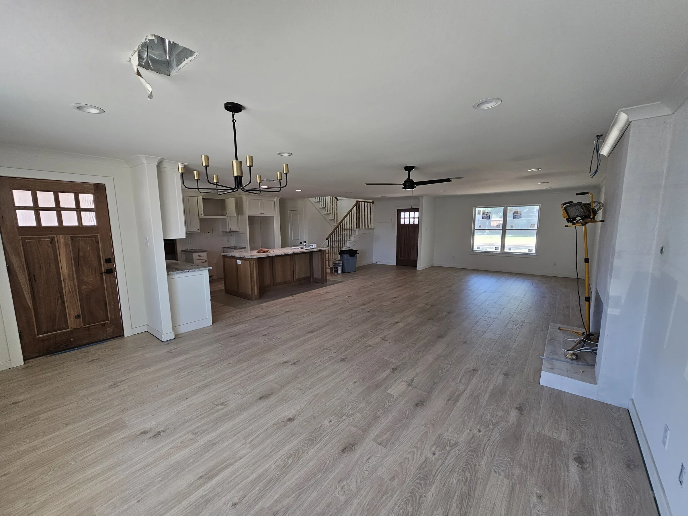 Interior of a custom home from the doorway, mid-build on the Mesquite remodel