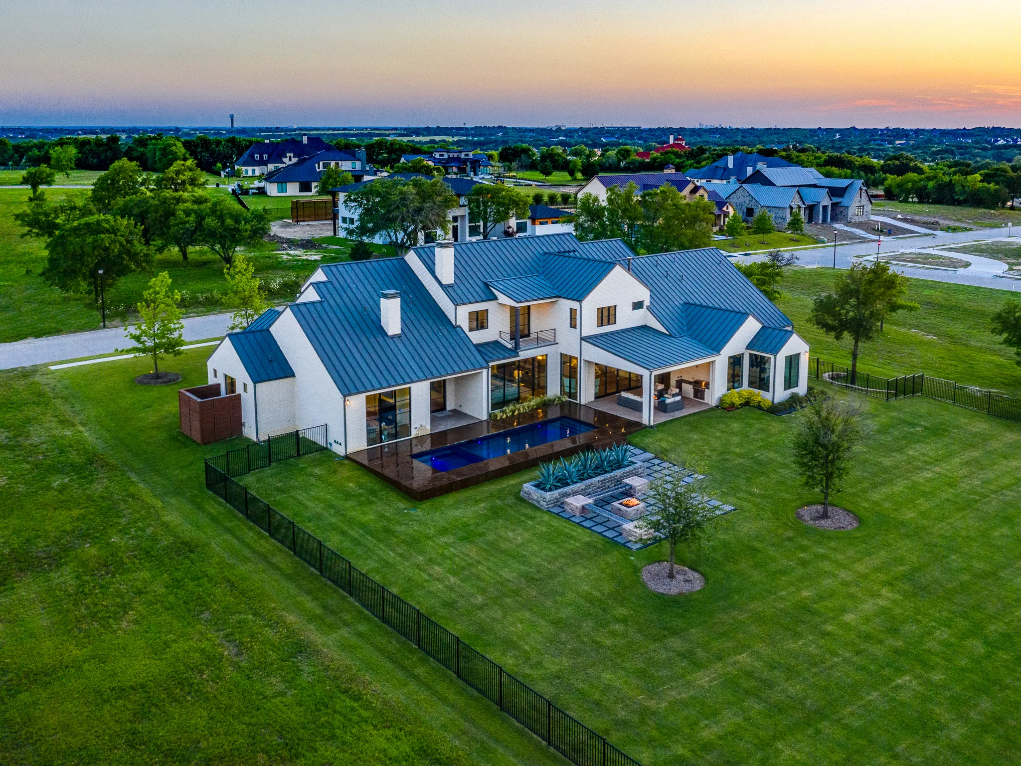 Aerial view of a custom home site from above, in daylight in Ridge Lakes of Heath