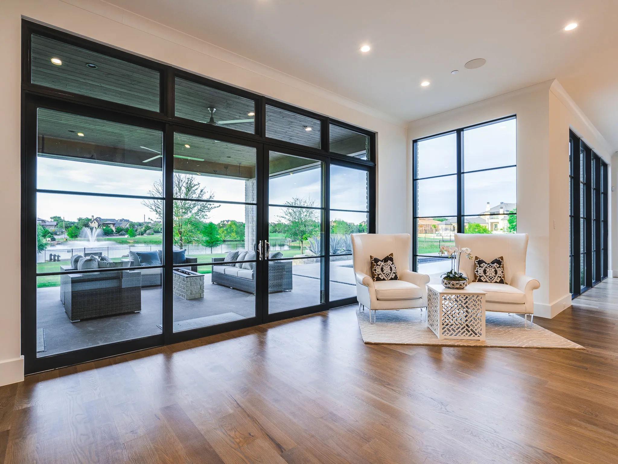 Exterior of a custom home from the street, with the finishes in in Ridge Lakes of Heath