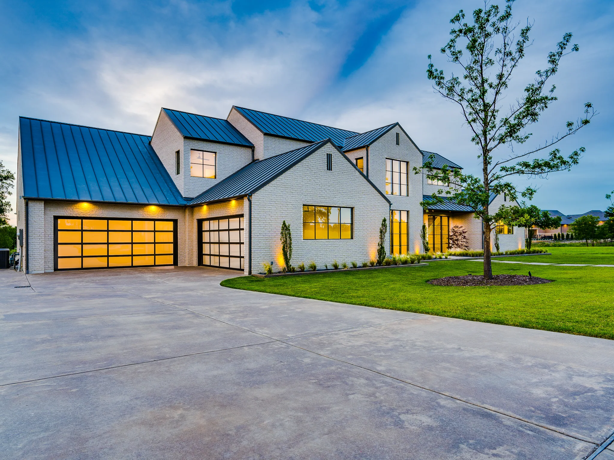 Exterior of a custom home from the rear yard, with the space empty in Ridge Lakes of Heath