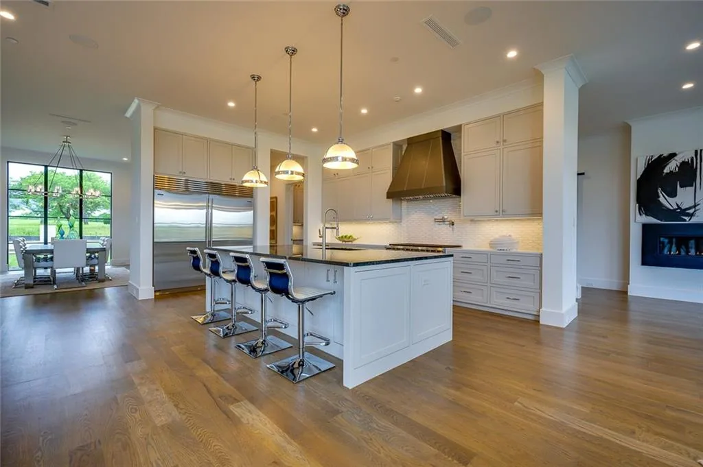 Interior of a custom home toward the ceiling detail, after completion in Ridge Lakes of Heath