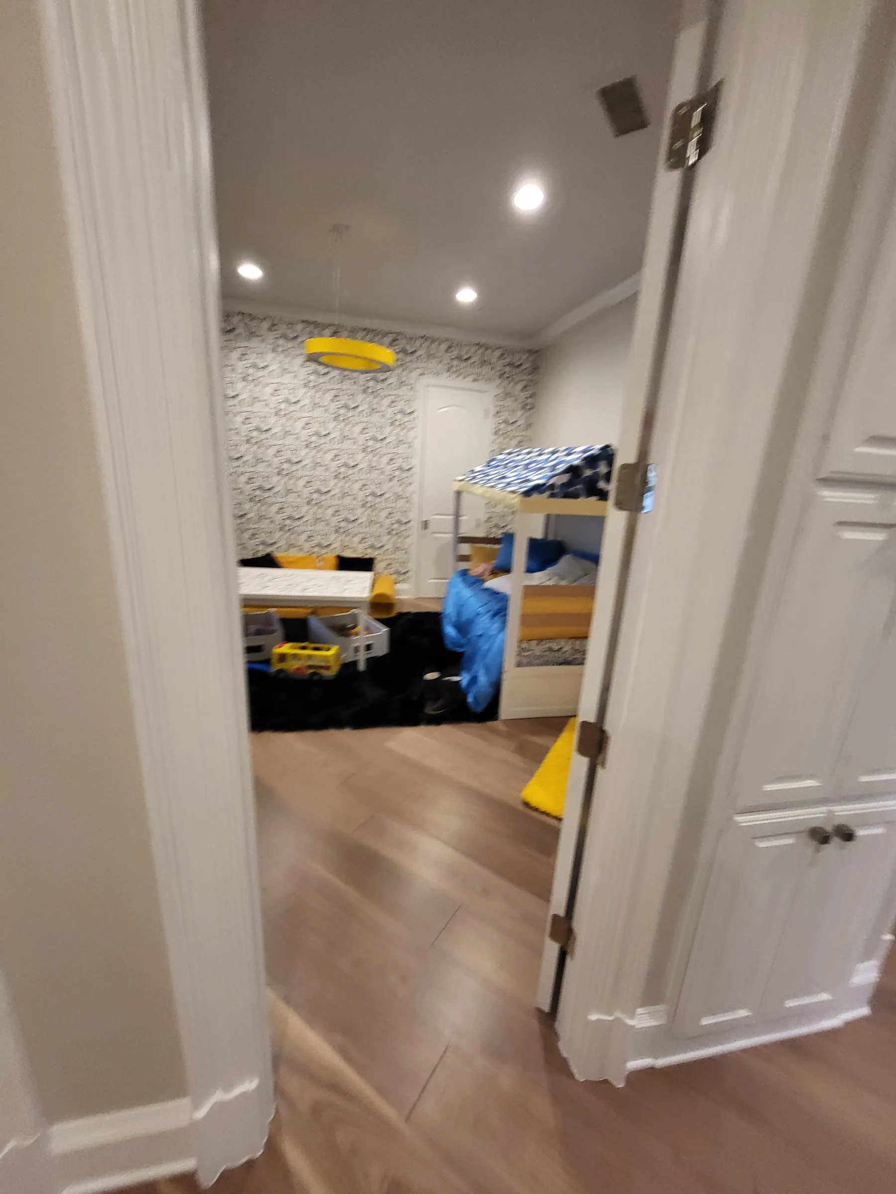 Interior of a custom home from the doorway, in daylight on the Shepherd’s Glen remodel