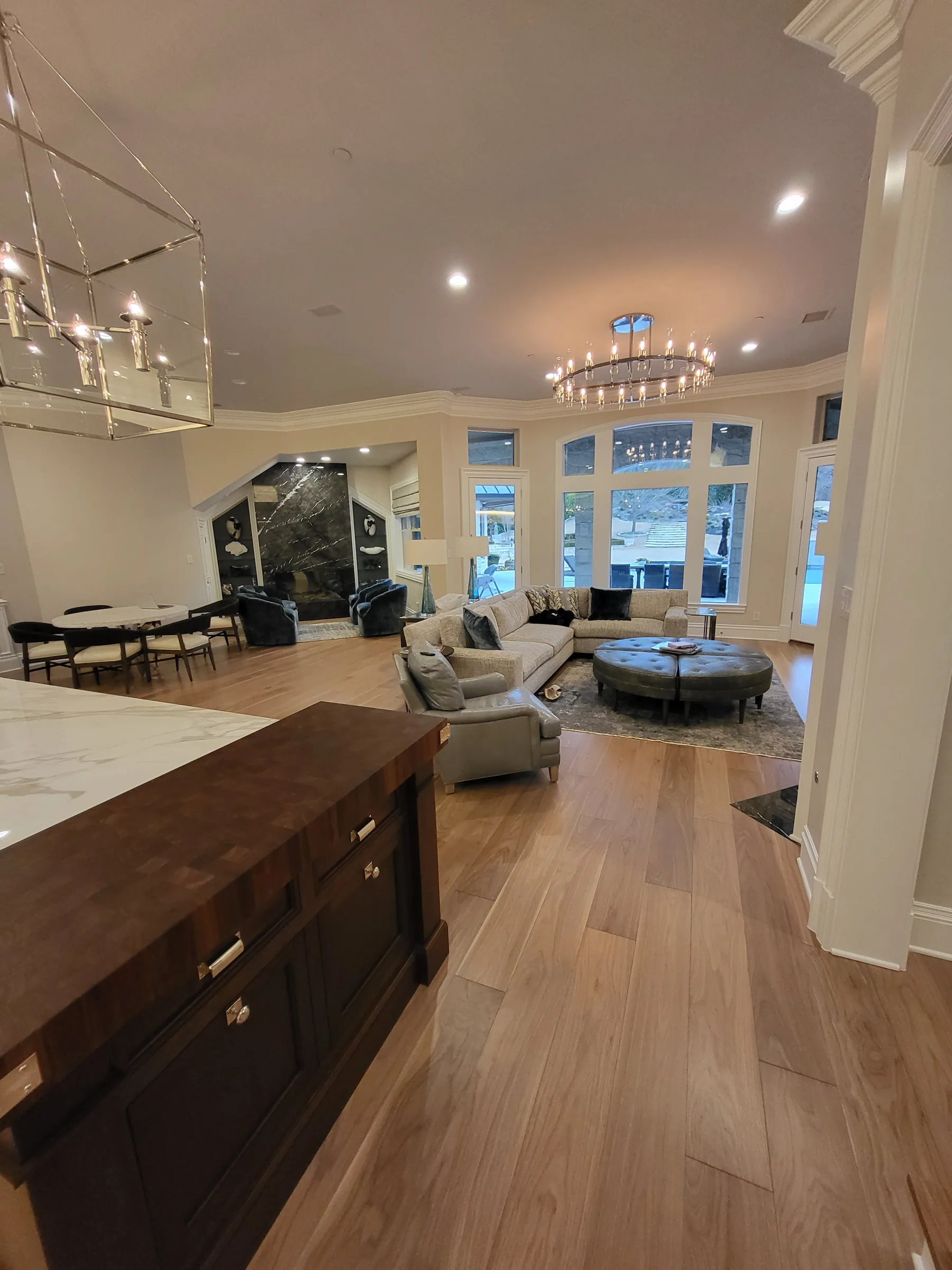 Interior of a custom home looking toward the windows, with the finishes in on the Shepherd’s Glen remodel