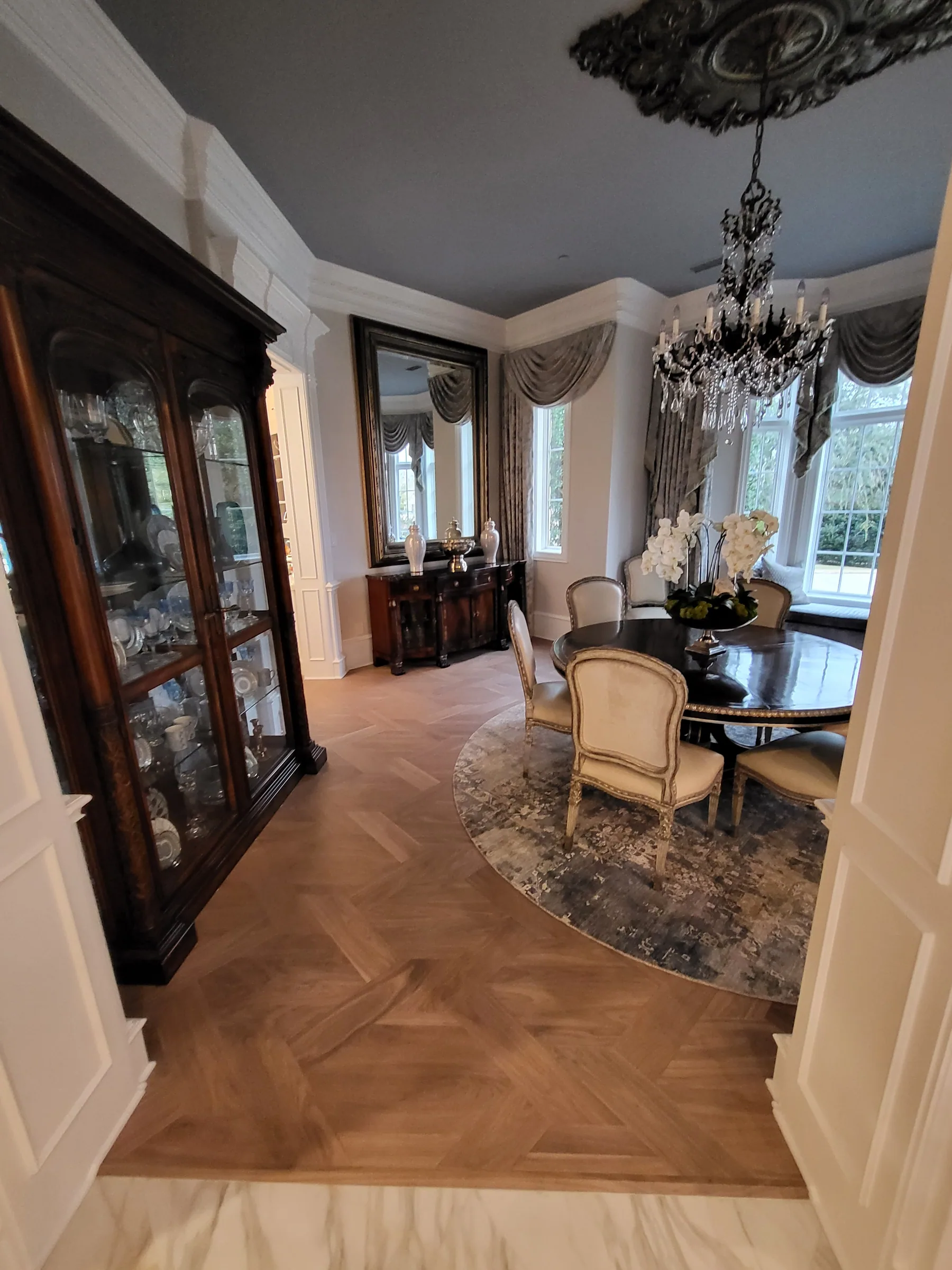 Interior of a custom home toward the adjoining room, with the finishes in on the Shepherd’s Glen remodel