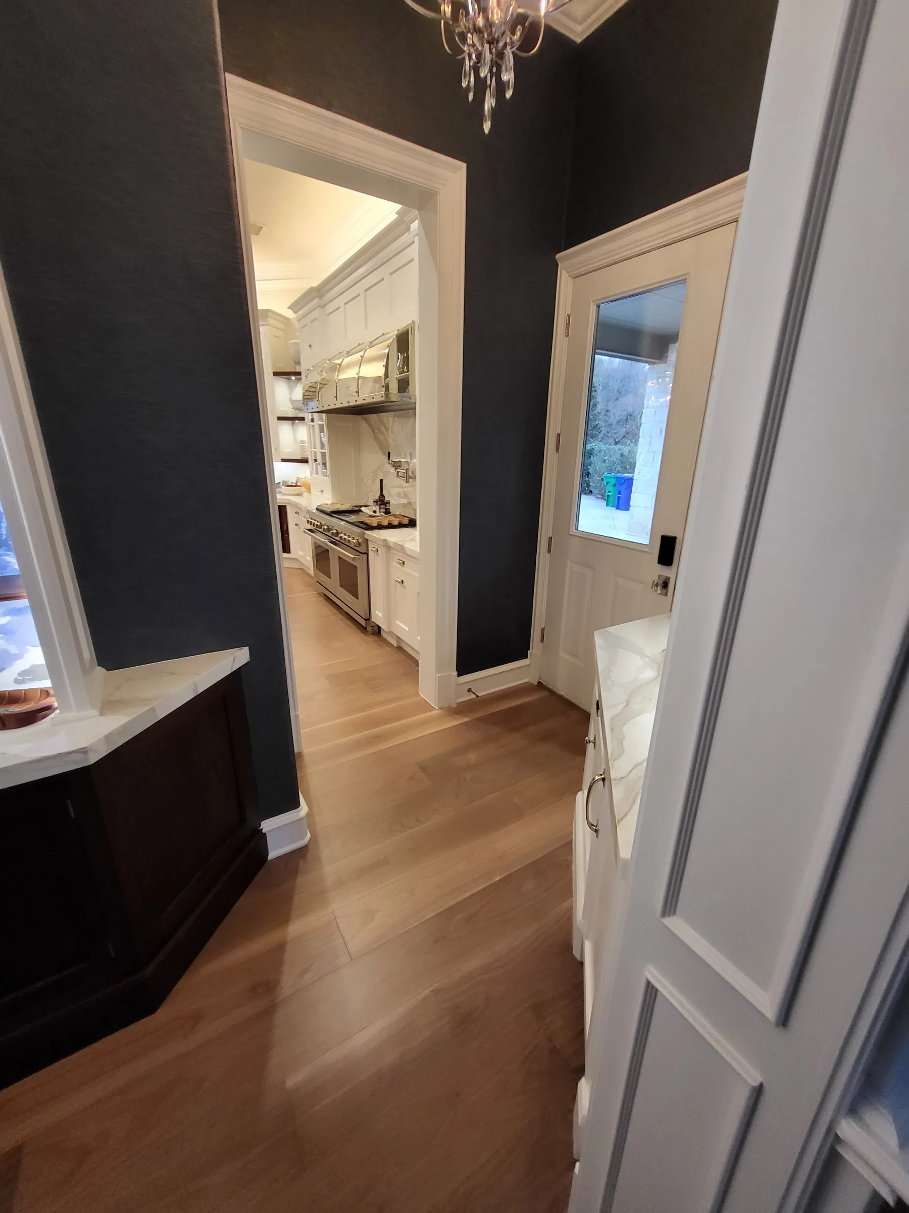Interior of a custom home from the doorway, mid-build on the Shepherd’s Glen remodel