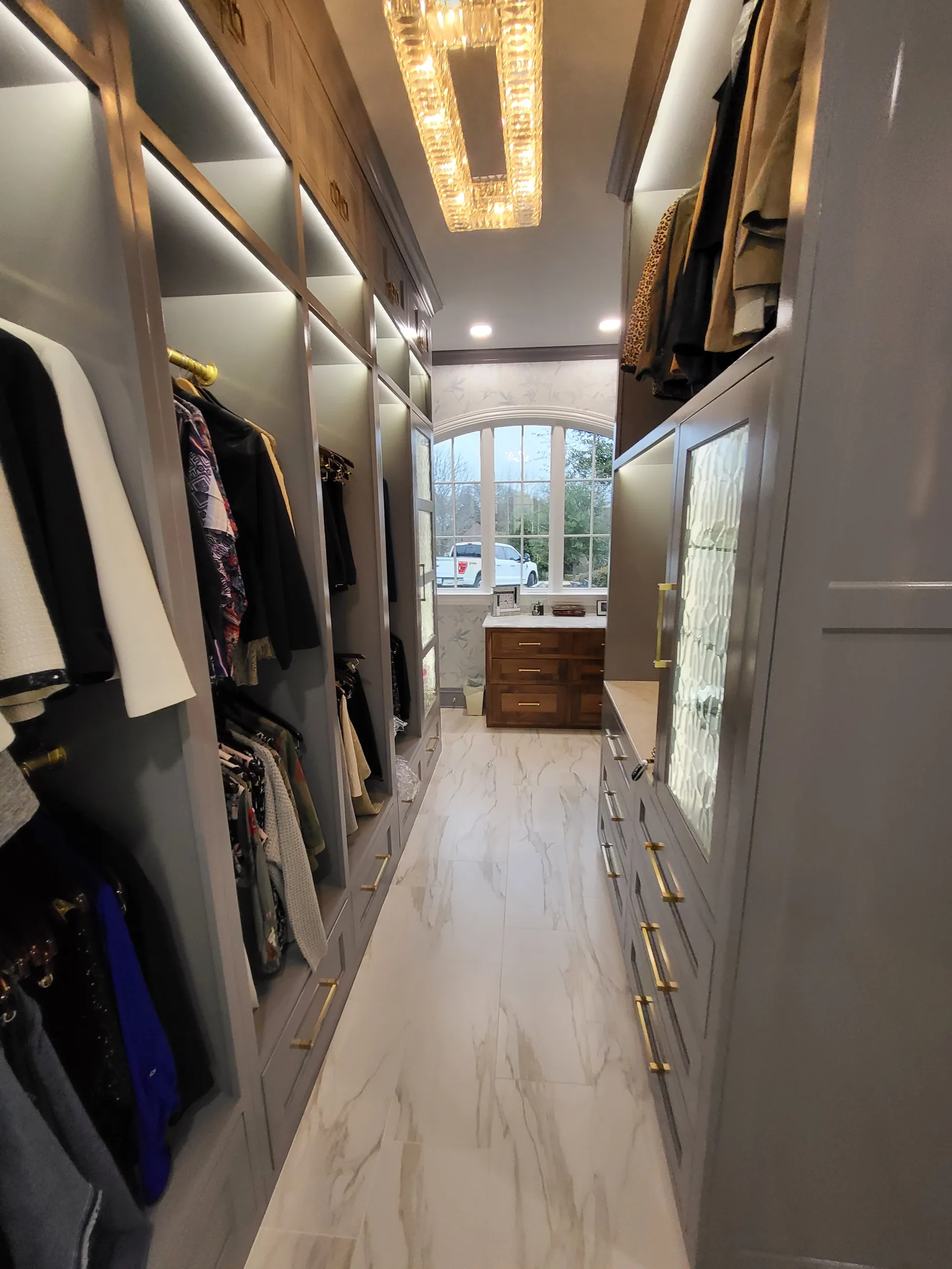 Interior of a custom home looking toward the windows, with the space empty on the Shepherd’s Glen remodel