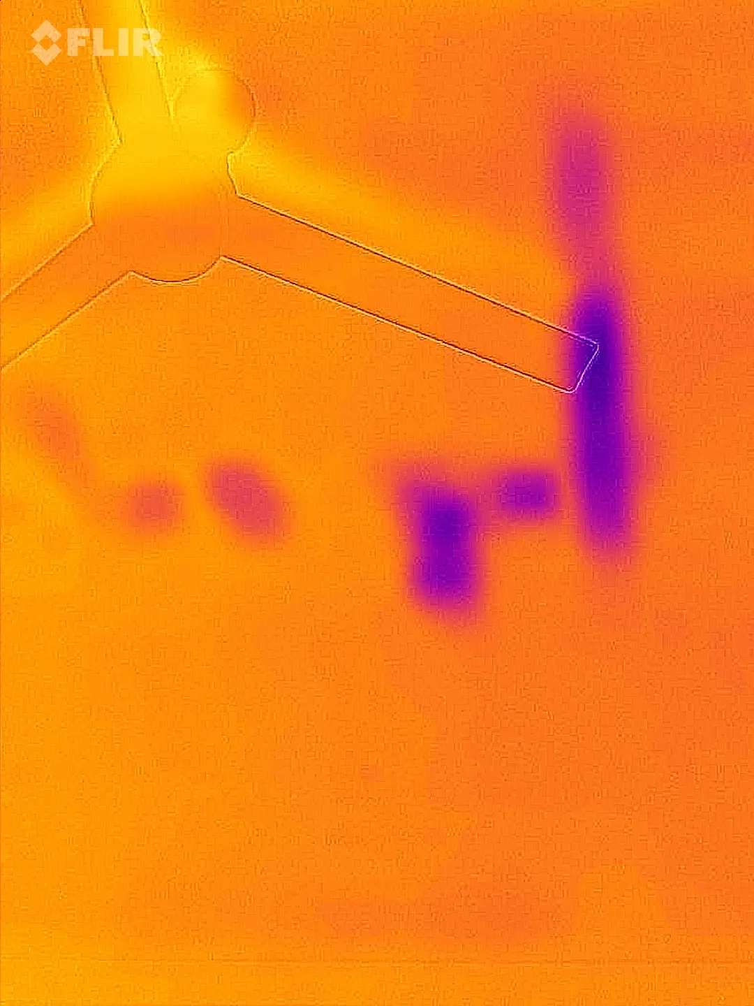 Thermal imaging scan during inspection at an exterior wall, mid-build during a thermal inspection