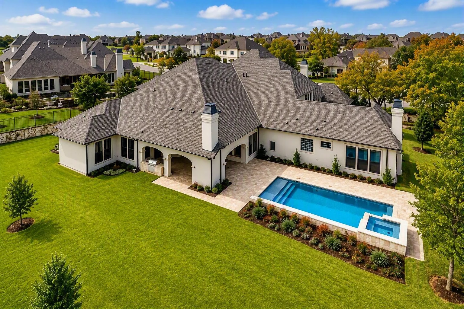 Exterior of a custom home from the driveway at Wimberly Place, Allen
