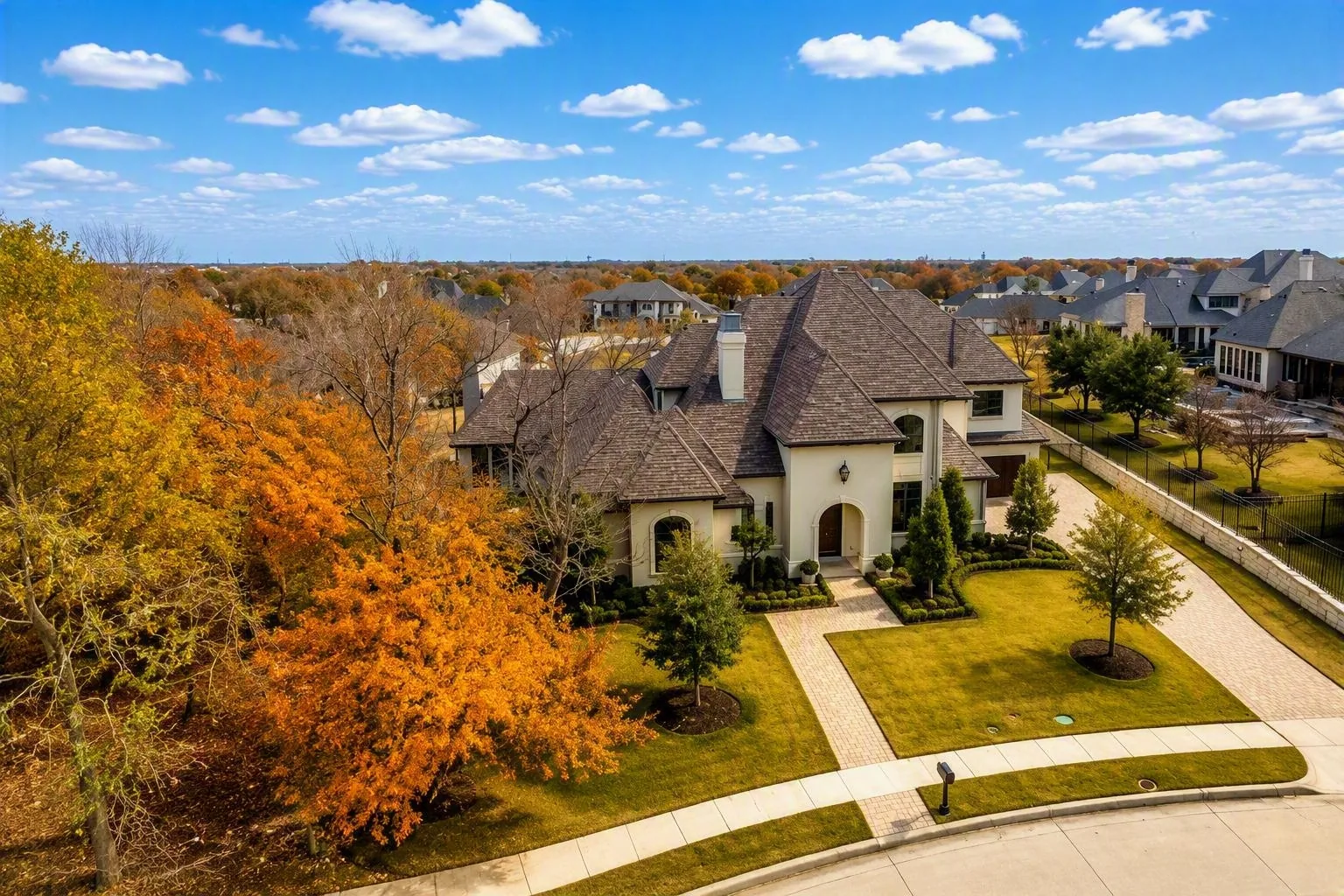 Interior of a custom home looking toward the windows, after completion at Wimberly Place, Allen