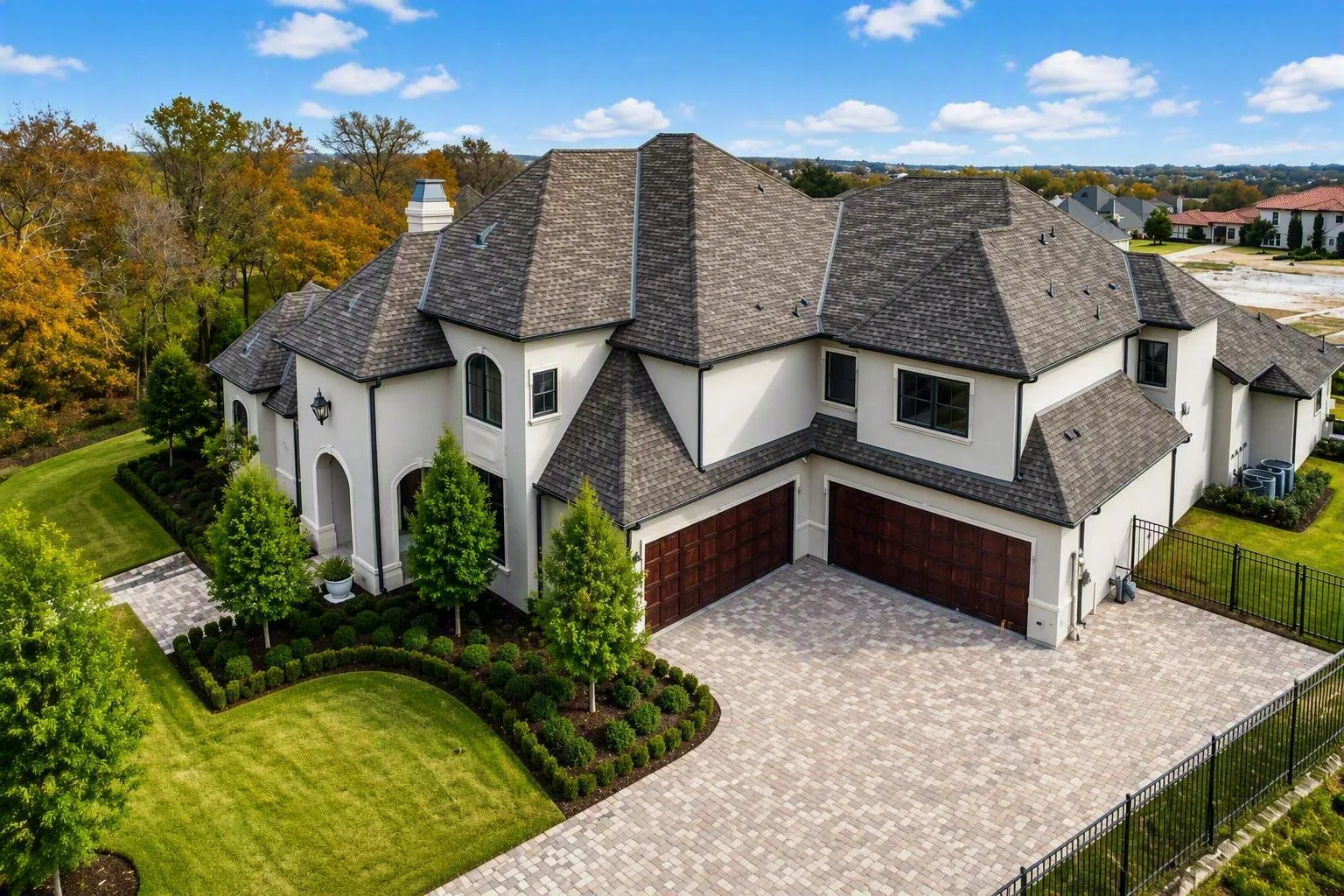 Exterior of a custom home along the side elevation at Wimberly Place, Allen